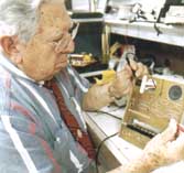 Jose Silva working on electronic circuit